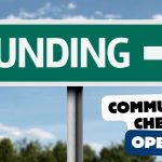 A road sign against a blue sky, which reads 'Funding'. The text 'Community Chest open' is overlaid.
