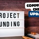 A sign on a desk reads 'Project Funding'. Overlaid text reads 'Community Chest Update'.